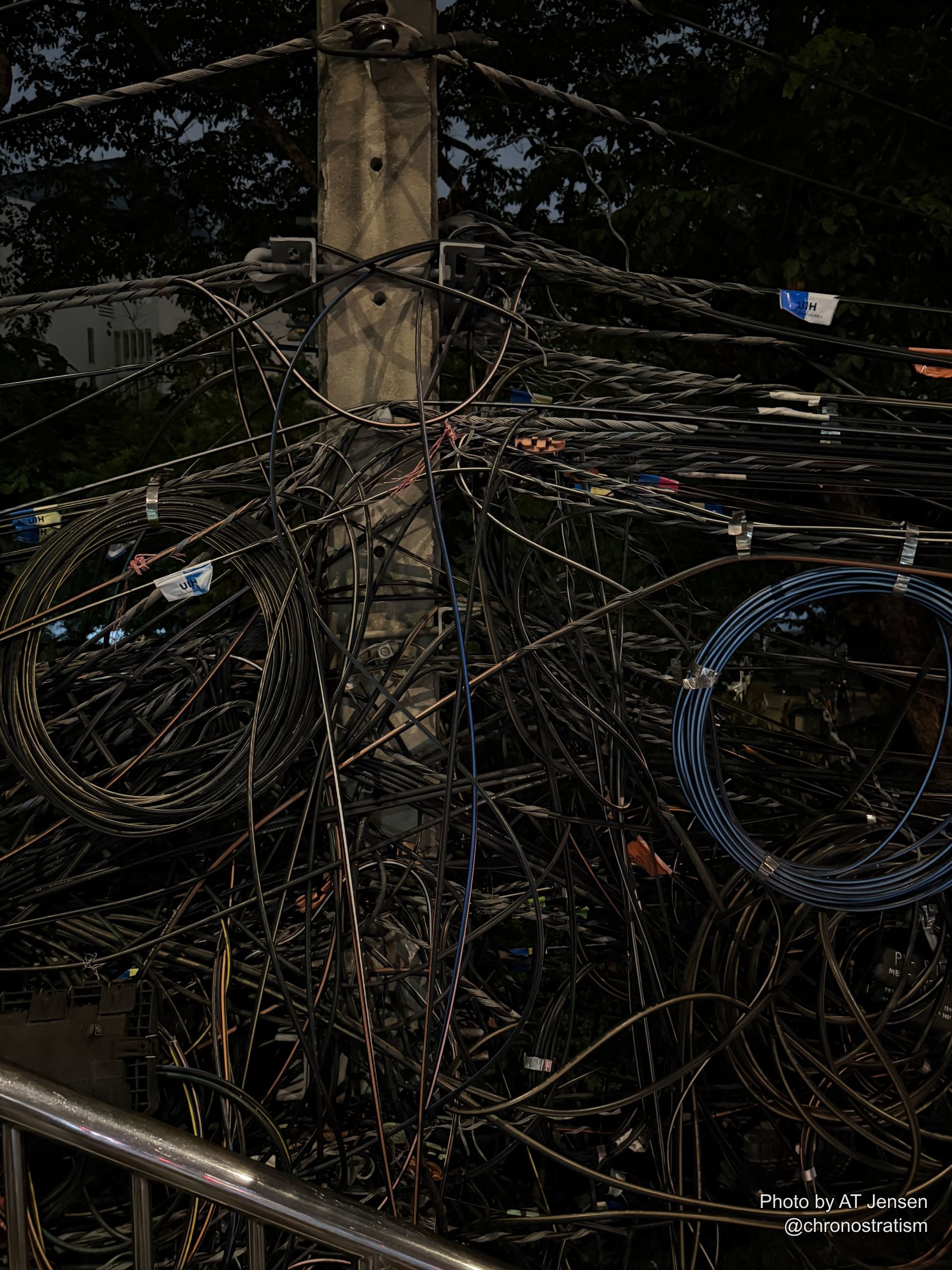Looping cable bundles converge on hand-stencilled codes MEA-01 and DMS#1.